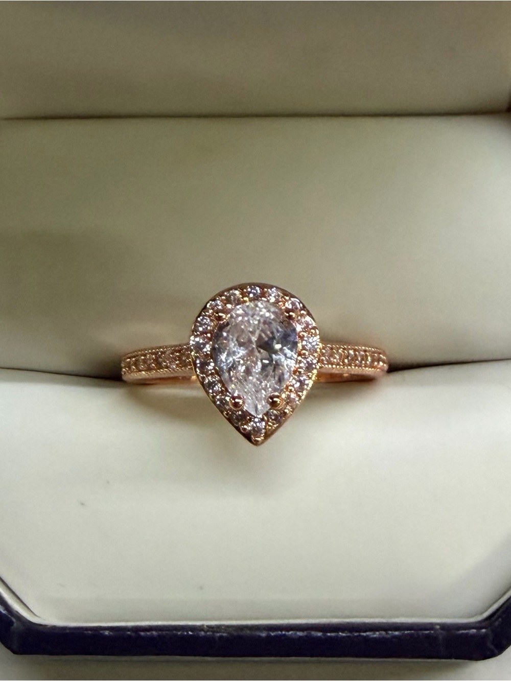 Pear-Shaped Halo Cubic Zirconia Ring in Rose Gold with Clear Center Stone